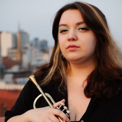 Alexandra Ridout holding trumpet